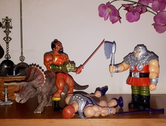 Jitsu has knocked out Fisto and faces Ram-Man, while the triceratops wishes she were somewhere else.