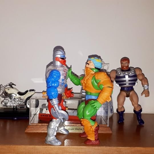 Duncan still tinkers with Roboto as Fisto looks on.