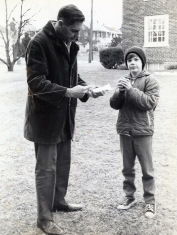 My father and me, testing a Cub Scout rubber-band rocket in about 1975. 