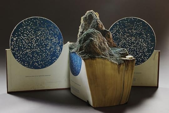 Mountain Carved From The Pages Of An Old Star Map Book