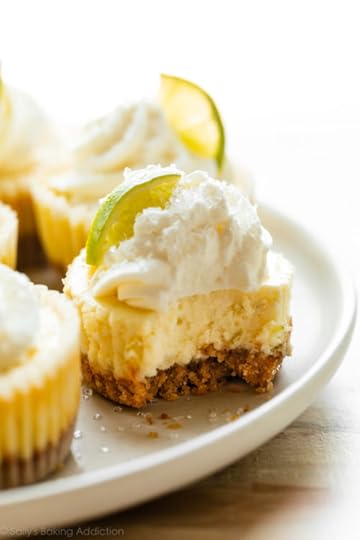 mini margarita cheesecakes with tequila whipped cream.