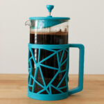 french press cold brew coffee on butcher block.