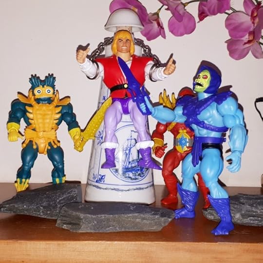 Skeletor, Beast-Man and Mer-Man threaten and chained up Prince Adam.