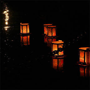 Toro nagashi floating lanterns on Shinobazu Pond in Ueno