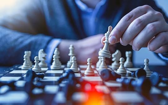 a person is playing chess himself
