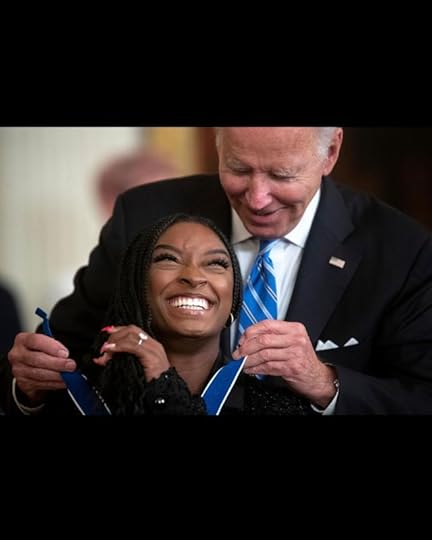 President Biden presents the Presidential Medal of Freedom to gymnast Simone Biles. (Tom Brenner for The Washington Post)