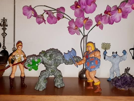 He-Man and Teela fight the rock monster