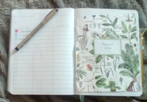 cover page for the month of August. A framed label reading 