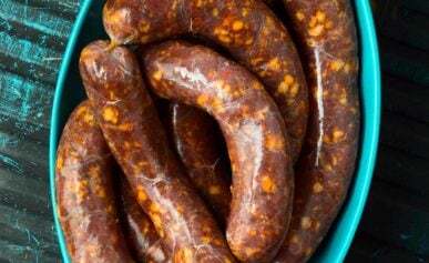 A platter of hot Italian sausages.