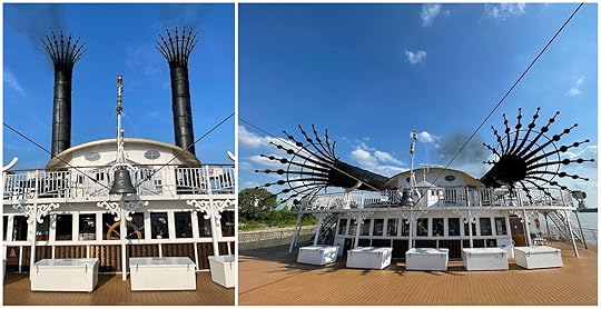 Smoke stacks of the American Queen straight up and lowered