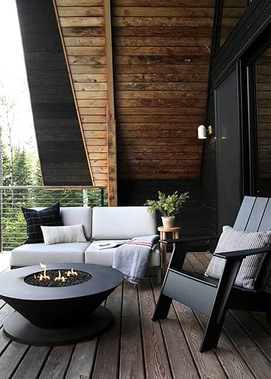 The Minne Stuga Deck with Loll Couch and firepit