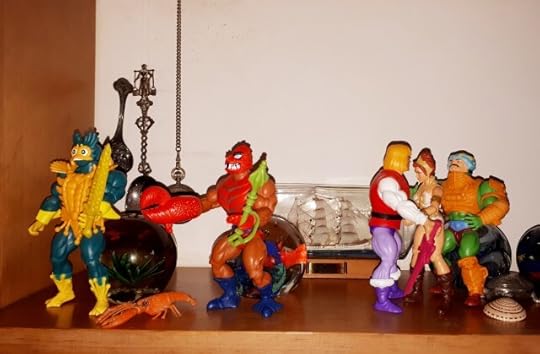 Duncan and Adam comfort Teela, while Clawful and Mer-Man make their escape.