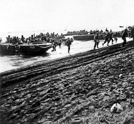 US First Division Marines storm ashore across Guadalcanal's beaches, 7 August 1942, from attack transport USS Barnett and attack cargo ship USS Fomalhaut (US National Archives: 80-CF-112-5-3)