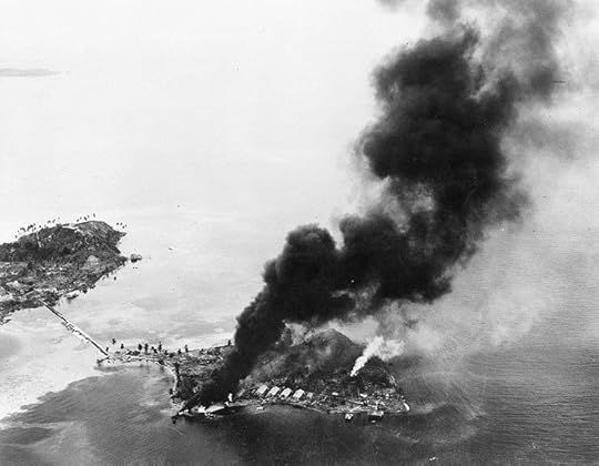 Japanese facilities on fire, Tanambogo Island, east of Tulagi, Solomon Islands, 7 Aug 1942 (US National Archives: 80-G-19223)