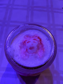 My head painted on a foamy cocktail