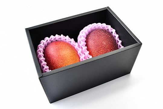Miyazaki mangoes in a box and protected by a styrofoam mesh