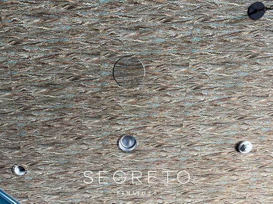 Speakers and cans painted to blend with wallcovering