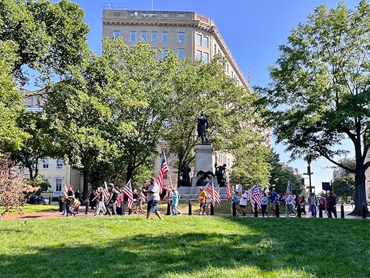 Marching to the White House to yell with a bullhorn