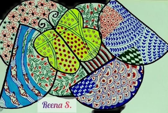 Pieces of colourful fabric overlaid with a cloth butterfly on top