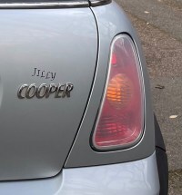 Close up of name badge on car showing 