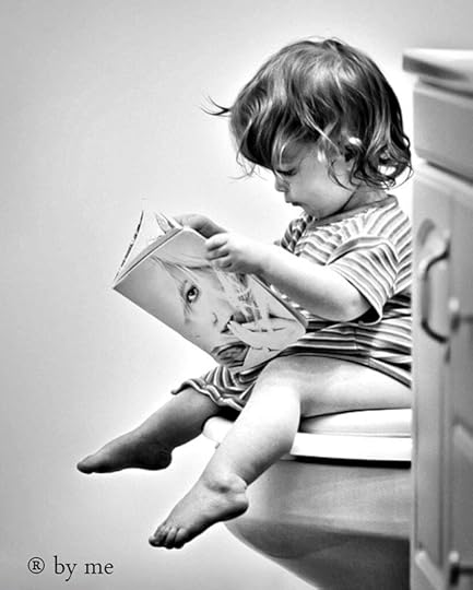 Girl reading on the toilet
