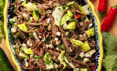 A platter of salpicón de venado, shredded venison salad.