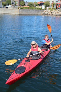 Steering on port side of kayak