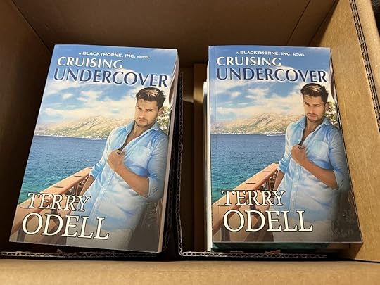 Box containing copies of Cruising Undercover by Terry Odell