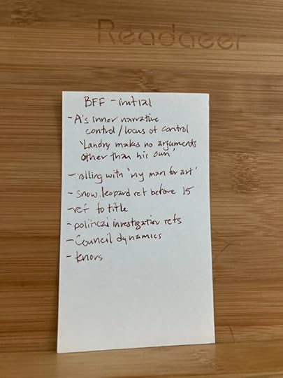 Index card with handwritten notes in copper ink, titled