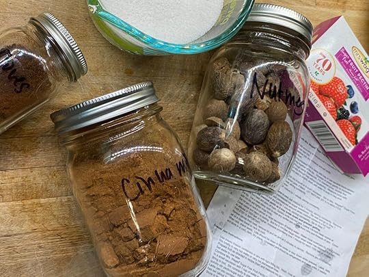 Close up on jars of spices for sugar free peach jam.