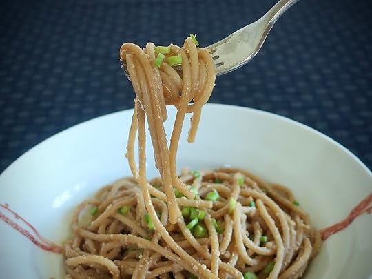 Photo of fork and plate of Japanese noodles with walnut sauce