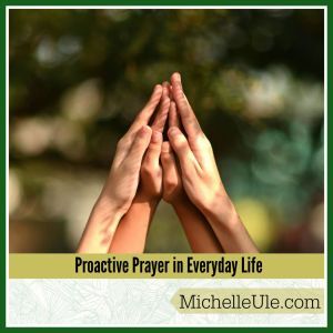 Four hands clasped in prayer