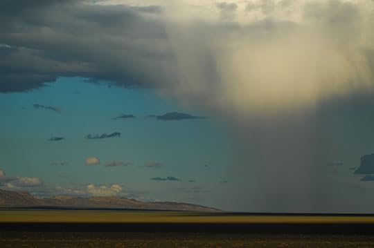 Photograph of rain clouds over a Mongolian desert. The power of a single word: petrichor, fills me with hope and memories of rain during this parched summer.