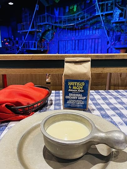bowl of creamy soup on a checkered tablecloth at the theater