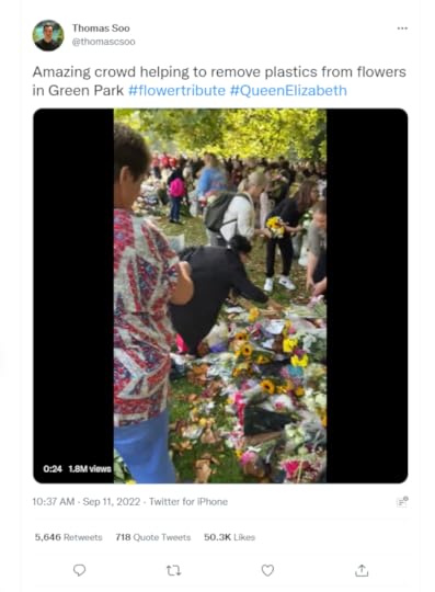 Crowd removing plastic waste from floral tributes