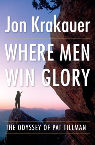 Cover shows a steep mountain outcrop with a man standing on the left, outmost point, with a wall of rock behind him. In the distance are Afghanistan mountains. The man in military gear is unidentifiable. 