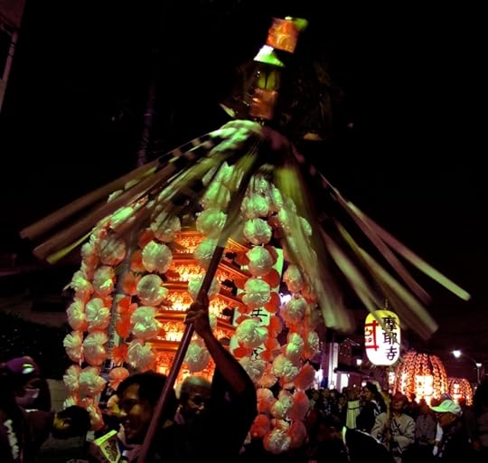 Flower bedecked miniature pagodas in the Oeshiki Ikegami festival of 10,000 lanterns