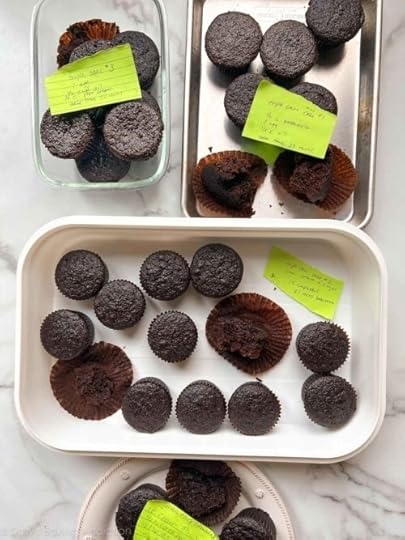 chocolate cupcakes in various containers.