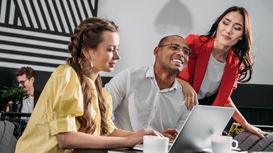 young happy business partners spending time in cafe