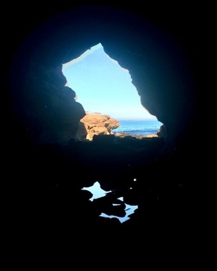 a dark cave and a map of witches