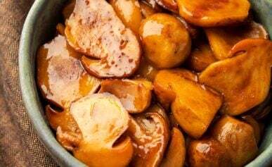 A bowl full of teriyaki mushrooms, made with porcini.