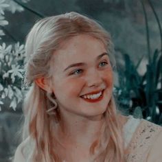 This contains an image of: Elle Fanning