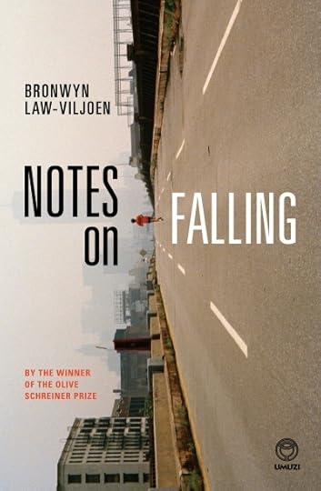 An urban landscape turned sideways, the road going up the middle, with a white person jogging away from the camera in a red t-shirt. 