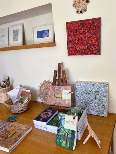 Books for sage in a painting studio