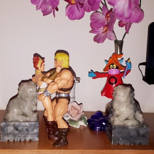 Orko interrupts He-Man and Teela kissing.