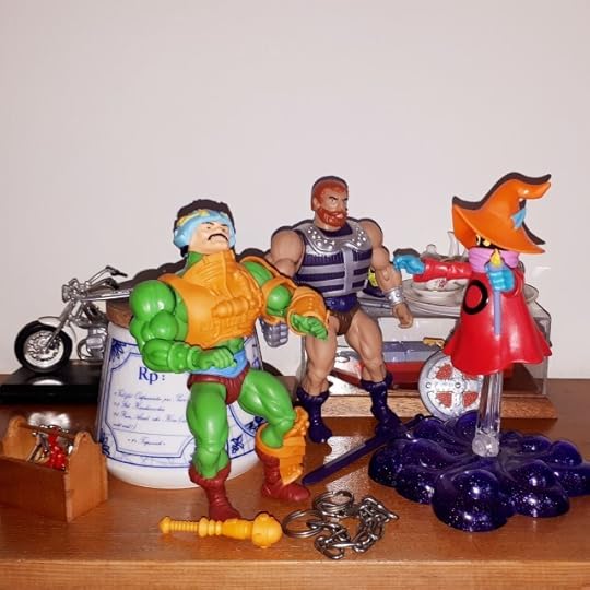Duncan, Malcolm and Orko celebrate driving off Evil-Lyn and Mantenna.