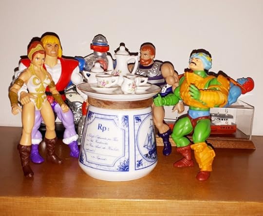 Adam, Teela, Roboto, Fisto and Duncan are having tea.