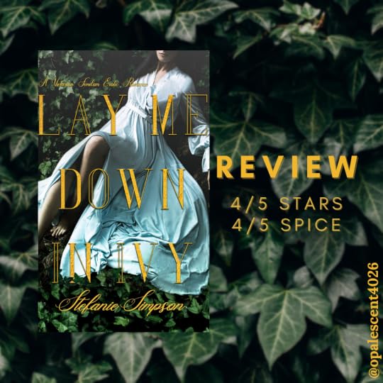 Blurred background of dark green ivy leaves, Review 5/5 stars and 4/5 spice. Cover: Lay Me Down In Ivy by Stefanie Simpson, a victorian femdom erotic romance. A woman with long dark hair wearing a white, long sleeved wrap dress reclines in a bed of ivy