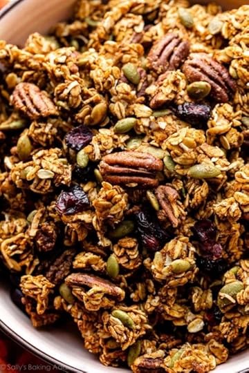 close-up photo of pumpkin spice granola with pecans and dried cranberries.