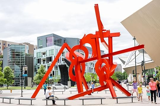 Plaza with red sculpture near Denver Art Museum one of the best things to do in Denver